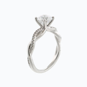 
          
          Load image into Gallery viewer, 1.20ct Edna Moissanite Round Twist Pave Diamonds 18k White Gold Ring
          
          