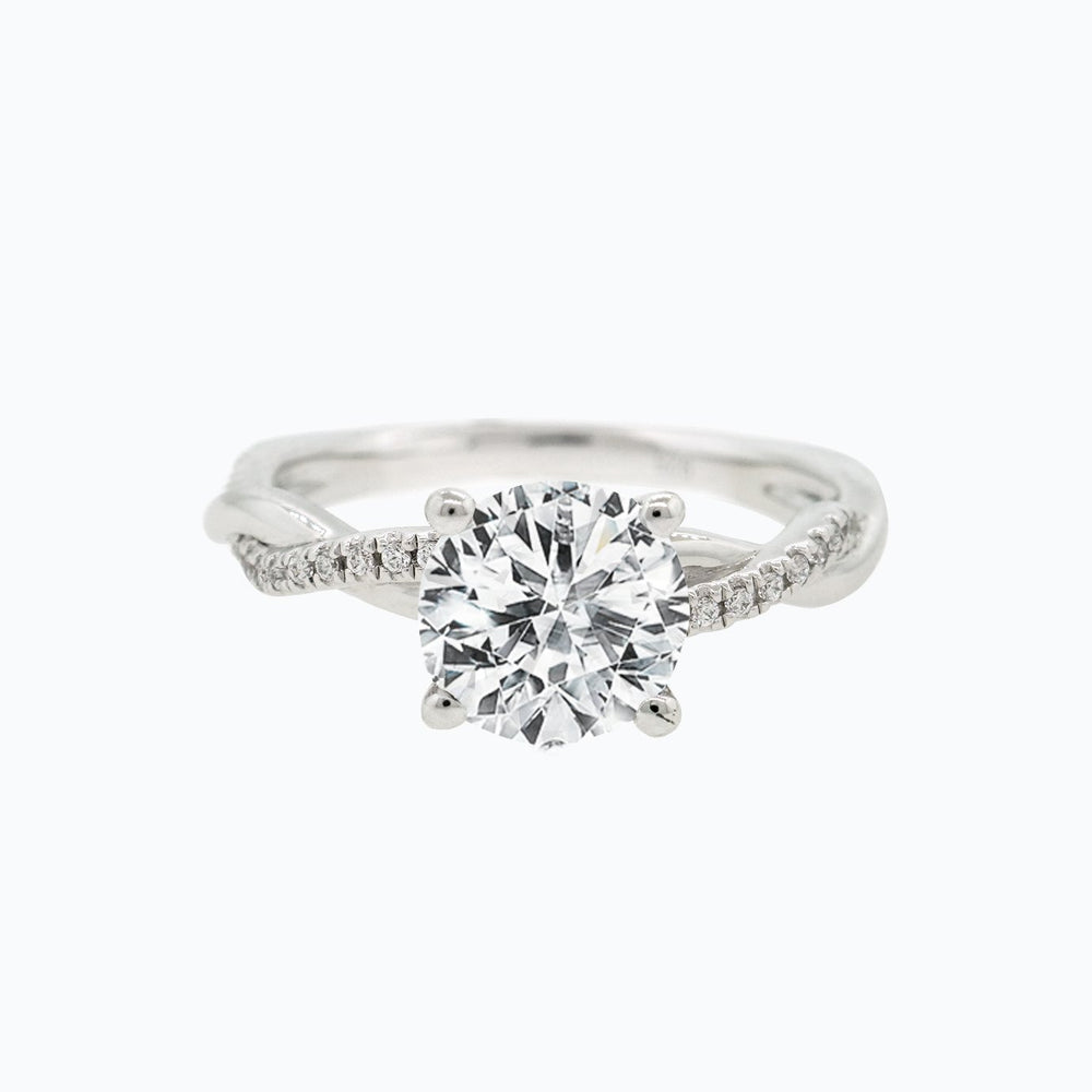 
          
          Load image into Gallery viewer, 1.20ct Edna Moissanite Round Twist Pave Diamonds 18k White Gold Ring
          
          