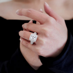 
          
          Load image into Gallery viewer, Elda Moissanite Cushion Halo Pave Diamonds Platinum Ring
          
          