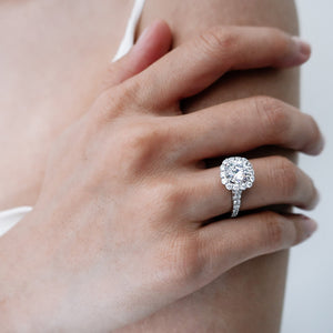 
          
          Load image into Gallery viewer, 1.50ct Nelia Moissanite Round Halo Pave Diamonds 18k White Gold Ring
          
          